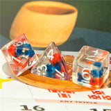 7pcs RPG Full Dice Set - Blue & Red Flowers in Clear Resin